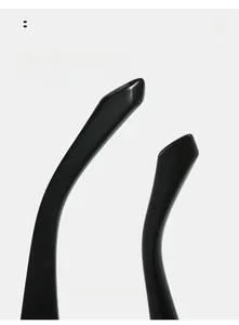 Detail of curved ergonomic temple tips on glossy black sunglasses for comfortable wear