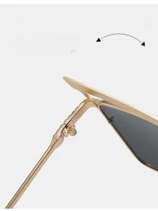 Close-up of durable metal hinge on vintage cat eye sunglasses with gold frames