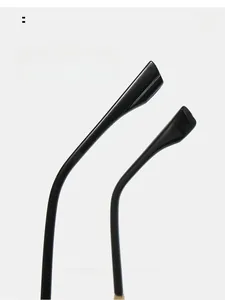 Macro detail of glossy black curved temple tips for ergonomic sunglasses comfort