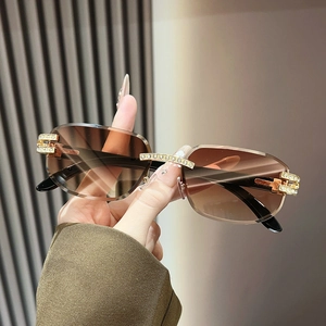 Frameless square sunglasses with rhinestone bridge and gradient brown lenses for women