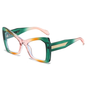 Lunettes de soleil œil de chat chic avec monture dégradée et branches dorées