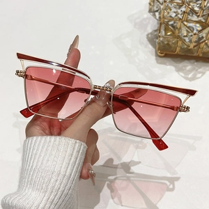 Vintage cat-eye metal sunglasses with pink gradient lenses and dual-layer frame design