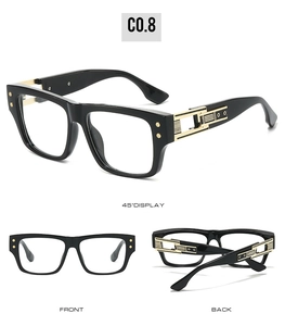 Vue triple de lunettes rétro à monture noire avec branches dorées ajourées