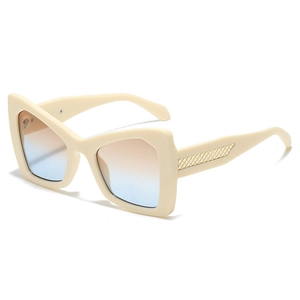 Classic large-frame cat-eye sunglasses with cream frames and gradient lenses shown at 45-degree