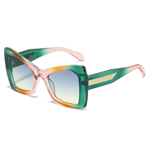 Oversized butterfly sunglasses with gradient frame and gold woven metal temple detail