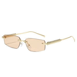 Retro rimless rectangle sunglasses with gold pyramid studded temples and brown tinted lenses