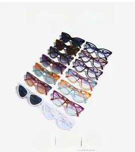 Macro shot of stylish butterfly frame sunglasses in various trendy gradient colors