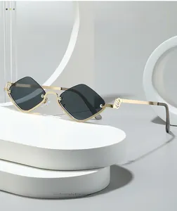 Detailed macro view of diamond-shaped dark lenses and gold metal frame temples
