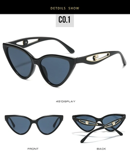 Detail of black butterfly cat-eye sunglasses with elegant pearl and hollow metal accents
