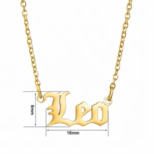 Macro detail of gold Leo zodiac necklace with measurements of 9mm by 16mm pendant size
