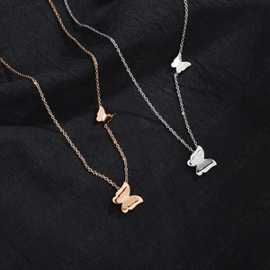 Elegant stainless steel necklace with double butterfly pendants in rose gold and silver finish