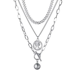 Three-layer silver necklace with Cuban chain, coin pendant, and paperclip toggle clasp