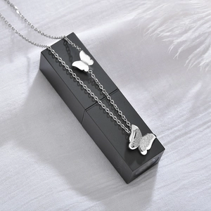 Elegant stainless steel double butterfly pendant necklace with matte and polished finish