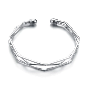 Silver geometric multilayer open bangle featuring a modern minimalist layered wire design