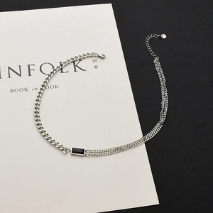 Double-layered titanium necklace with rectangular black gemstone and cuban chain link