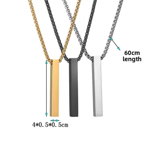 Detailed view of geometric column pendants in gold, black and silver with 60cm box chains