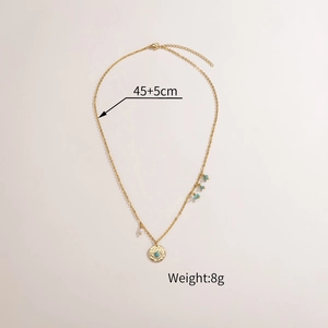 Detailed view of evil eye pendant necklace with turquoise beads and 45cm chain length