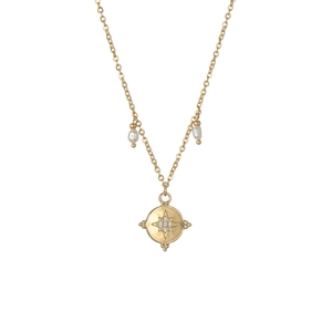 French vintage gold necklace with starburst pendant and teardrop pearls for women