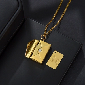 Golden envelope locket necklace with Love You engraved letter charm on leather gift box