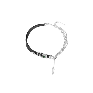Punk-style spliced necklace with green gem snake charm and silver conical pendant
