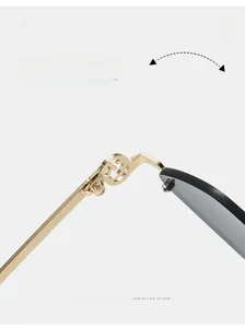 Detailed macro view of durable gold metal hinge on retro half-frame diamond sunglasses