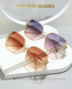 Detail of gold metal sunglasses frame with hollow star decor and gradient lenses
