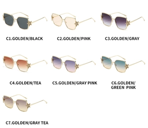 Collection of oversized golden star sunglasses in seven gradient color combinations