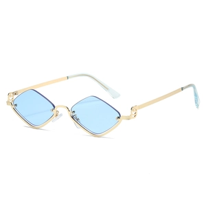 Retro semi-rimless diamond-shaped sunglasses with light blue lenses and gold metal frames