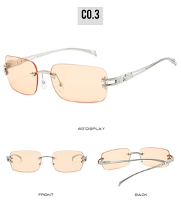 Detailansicht der randlosen Sternen-Sonnenbrille mit orangefarbenen Gläsern und Bügeln