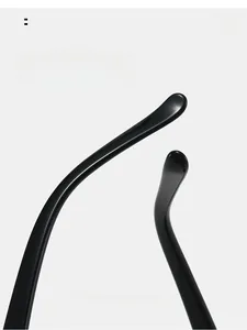 Macro detail of ergonomic curved temples on rimless sunglasses for enhanced comfort