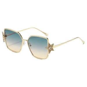 Golden oversized star sunglasses with blue-yellow gradient lenses and star decor