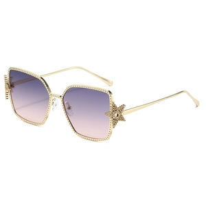 Fashion gold metal sunglasses with star decor and gradient purple lenses