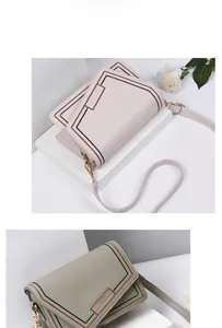 Detail view of pink and grey PU leather bags with geometric stitching and metal buckles