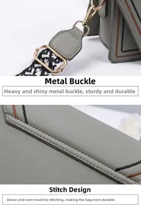 Detail of grey PU leather bag showing leopard print strap and gold hardware buckles