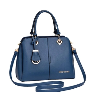 Minimalist large capacity dark blue pebbled leather tote bag with gold hardware and strap