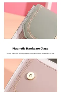 Close-up of golden magnetic buckle and decorative wheat-ear stitching on the two-tone bag