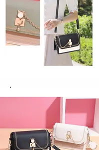 Close-up of cat-ear metal buckle and detailed stitching on a colorful PU leather handbag
