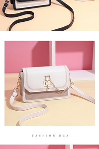 Close-up of V-quilted faux leather bag with gold hardware lock and beaded chain detail