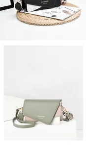 Detail of geometric color-block shoulder bag with metal chain strap and PU leather flap
