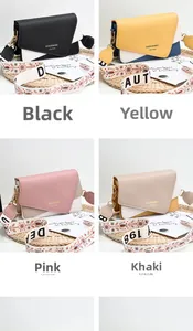 Detail view of stylish crossbody bags in black, yellow, pink, and khaki with wide floral straps