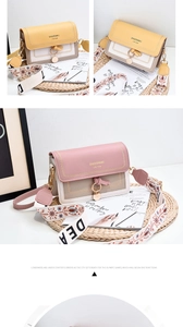 Detailed view of PU leather crossbody bags with contrast colors and tassel ring charms