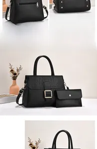 Detailed view of black crocodile pattern tote bag set with golden buckle and clutch