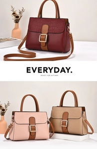 Detail of color-block stone pattern handbag with flap design and metal hardware buckle