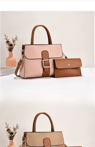 Detail of pink stone pattern flap handbag set including small matching pouch