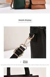 Close-up of pebble-textured leather shoulder bag with polished gold hardware buckles
