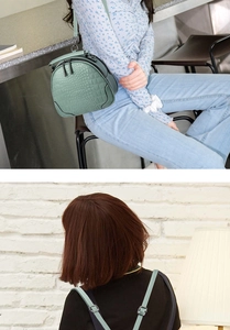Mint green crocodile embossed small round bag shown in crossbody and backpack styles