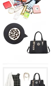 Detailed view of large capacity black tote bag with gold hardware and lychee leather texture