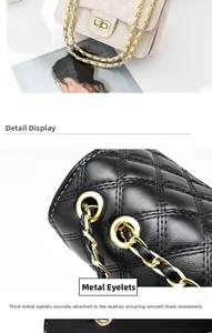 Detail of quilted diamond pattern and gold-tone twist lock on the leather chain bag