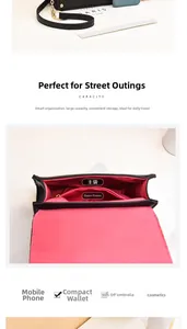 Interior view of black PU handbag featuring a magenta lining and zipper pocket