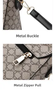 Close-up of golden metal hooks and high-quality zipper on a brown patterned crossbody bag